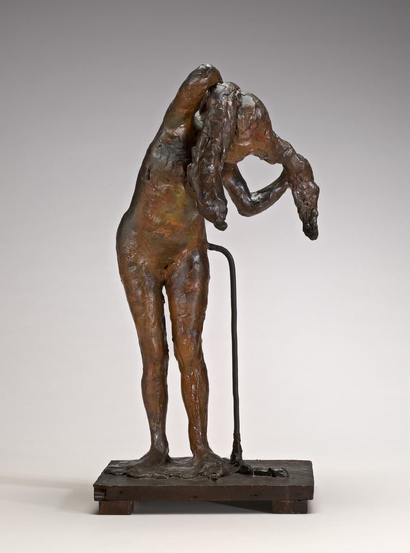 Woman Arranging Her Hair — Edgar Degas